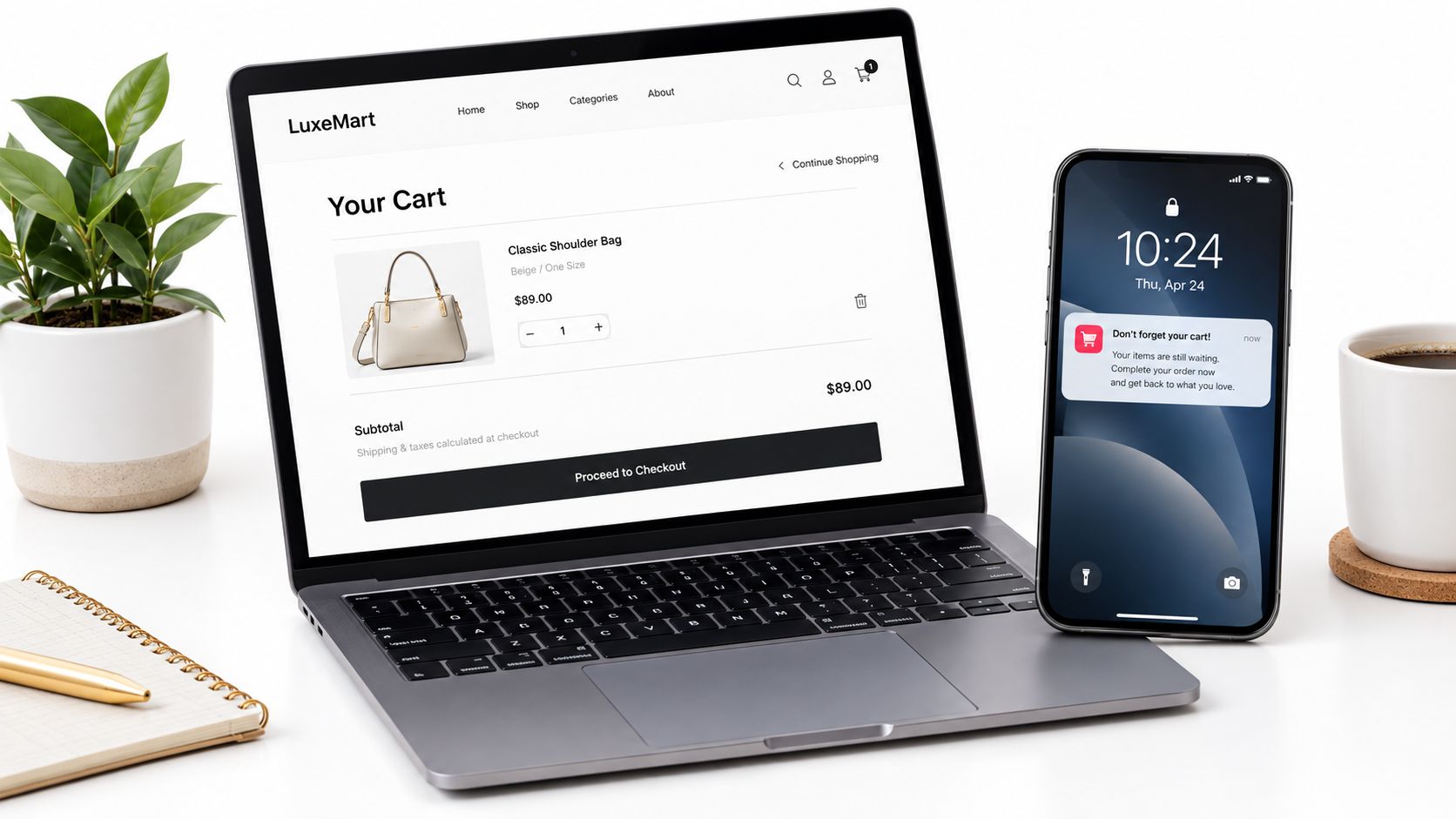 A laptop showing an online shopping cart next to a smartphone displaying a notification, illustrating an abandoned cart reminder.