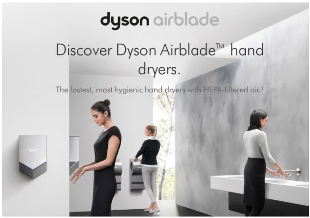 Dyson Airblade hand dryers in a restroom with the headline "Discover Dyson Airblade hand dryers"